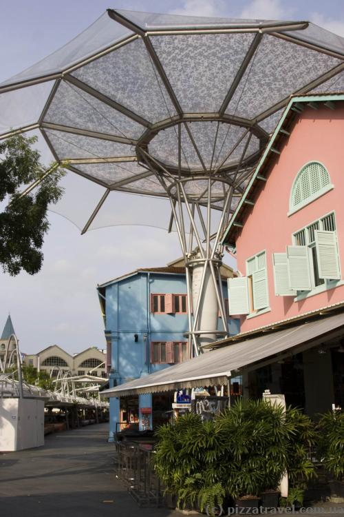 Clarke Quay is covered with sun umbrellas